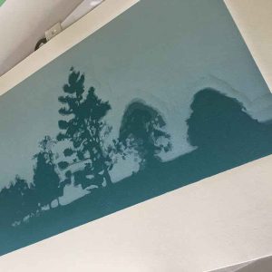 another layer down. the angle and light exaggerate the lines, but you can see the emboss lines on the print. thankfully they slowly disappeared as the print progressed.