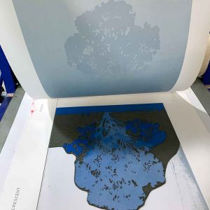 'Still' reduction linocut print, printing the first layer