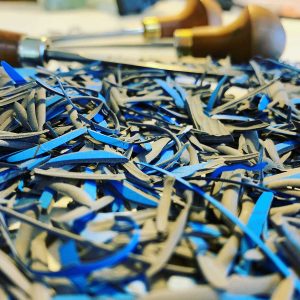 Doubt - embossing lino block, carving chips