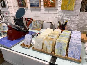 The letterpress printed postcard fronts