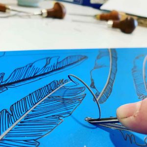 Magpie Stories - artist book embossing lino block carving