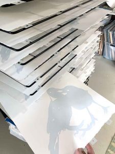 Magpie Stories - Siblings - reduction linocut - layer 1