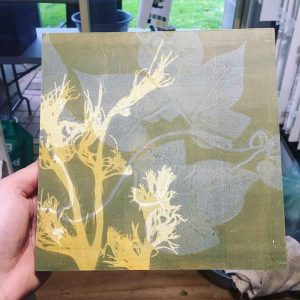 mount paper to wooden panel