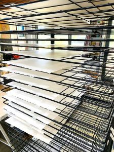 Kavieng - reduction linocut layer 1 on the drying rack