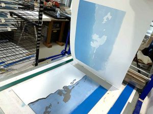 Eagles nest reduction linocut in progress