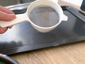 melt the gel plate and re-pour - strain out lumps with a sieve